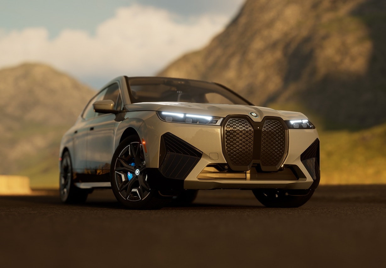 A gray BMW iX with a mountain range in the background. A gray BMW iX with a mountain range in the background.