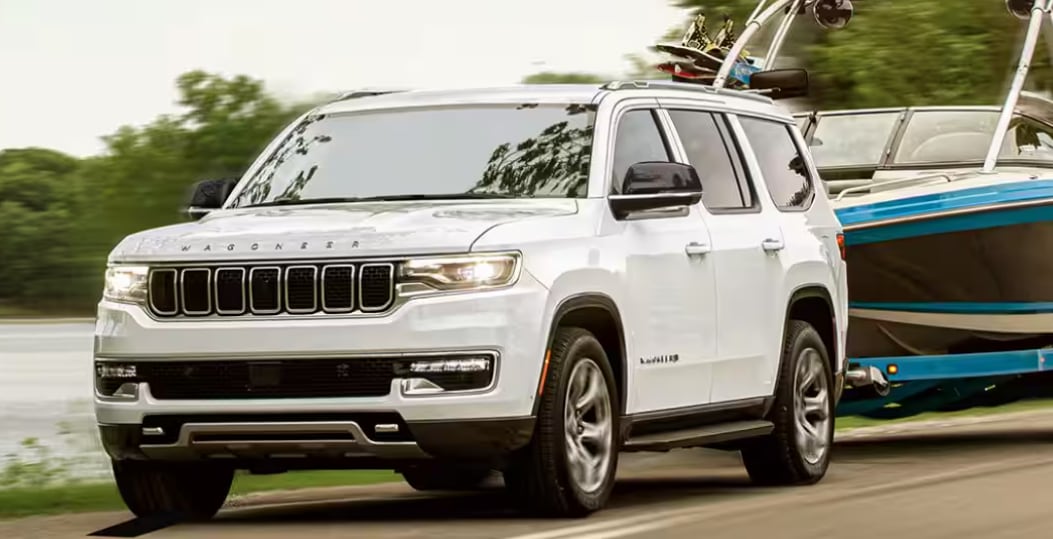 Jeep%20Wagoneer%20Pulling%20Boat.png