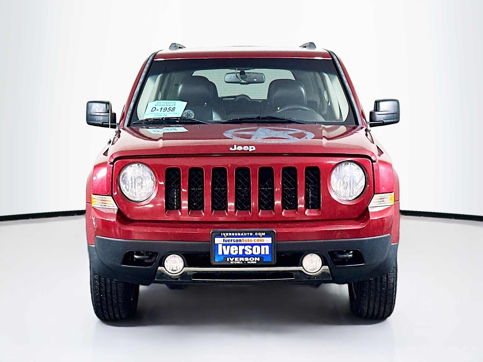 Used 2014 Jeep Patriot Latitude with VIN 1C4NJRFBXED601920 for sale in Huron, SD