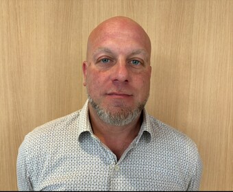 Staff member Neil Damaso from ID_3d92b793676f