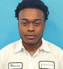 Staff member Hassan Izzard from ID_ad334968ea32
