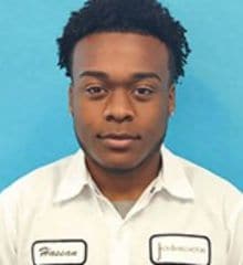 Staff member Hassan Izzard from ID_ad334968ea32