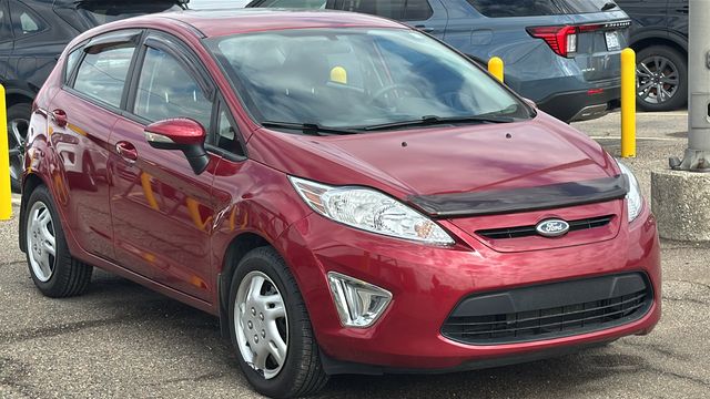 Used 2013 Ford Fiesta SE with VIN 3FADP4EJ7DM142439 for sale in Wayne, MI