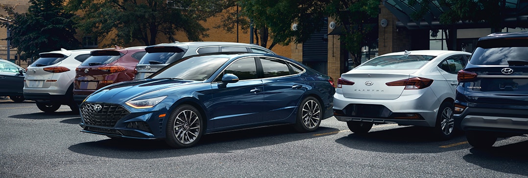 The 2021 Hyundai Elantra vs. The 2021 Hyundai Sonata at Jack Giambalvo Hyundai | Sonata backing into parking spot