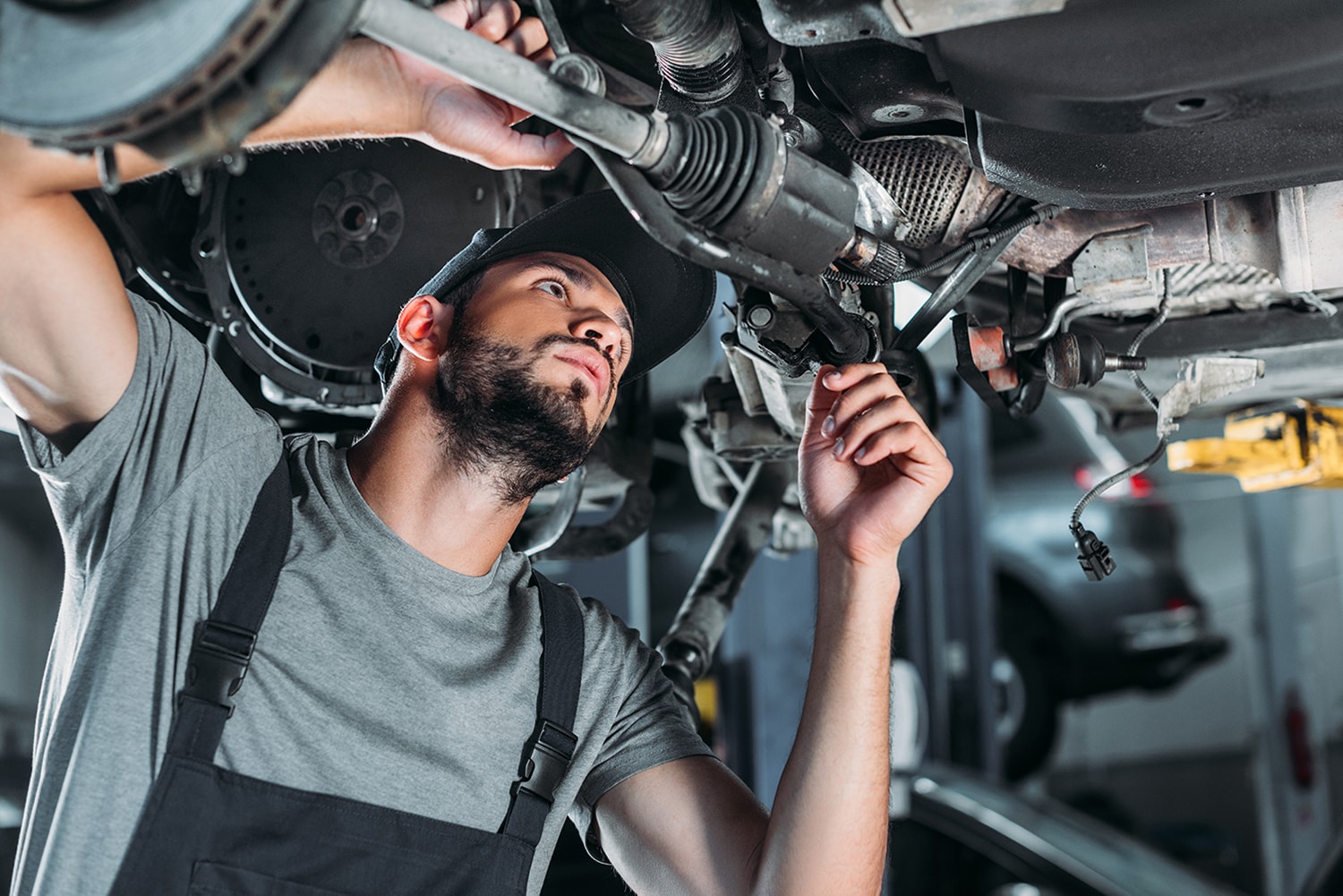 Hyundai Collision Center at Jack Giambalvo Hyundai in York | Service technician repairing axels under vehicle