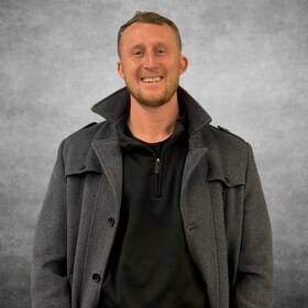 Staff member Christopher Romer from ID_84413b20533a