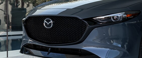 Model Features of the 2021 Mazda3 at Jack Giambalvo Mazda | Close up on Mazda3's front
