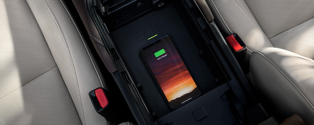 The 2022 Mazda CX-5 vs. The 2022 Mazda CX-30 at Jack Giambalvo Mazda | Wireless Charging Pad Inside 2022 Mazda CX-30