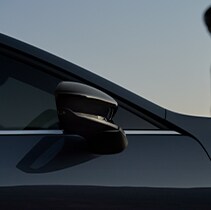 Model Features of the 2021 Mazda3 at Jack Giambalvo Mazda | Close up on mirror