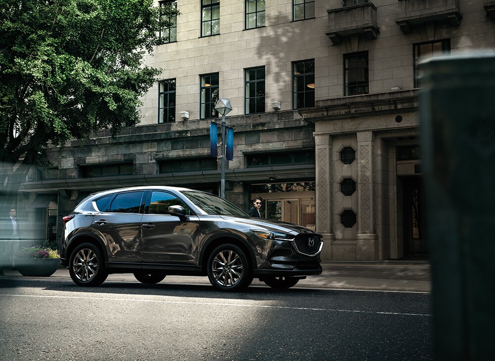 Jack Giambalvo Mazda is a Car Dealership near Manchester PA | 2021 Mazda CX-5 driving through old city