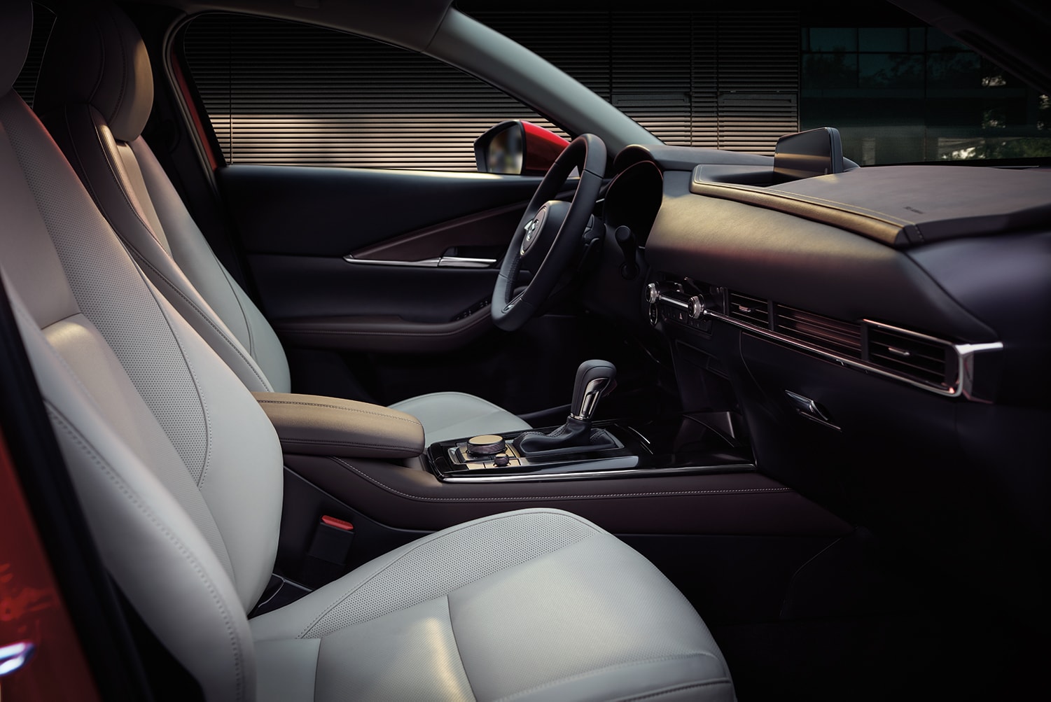 Compare the 2021 Mazda CX-30 vs. the 2022 Honda HR-V at Jack Giambalvo Mazda | 2021 Mazda CX-30 interior front seats