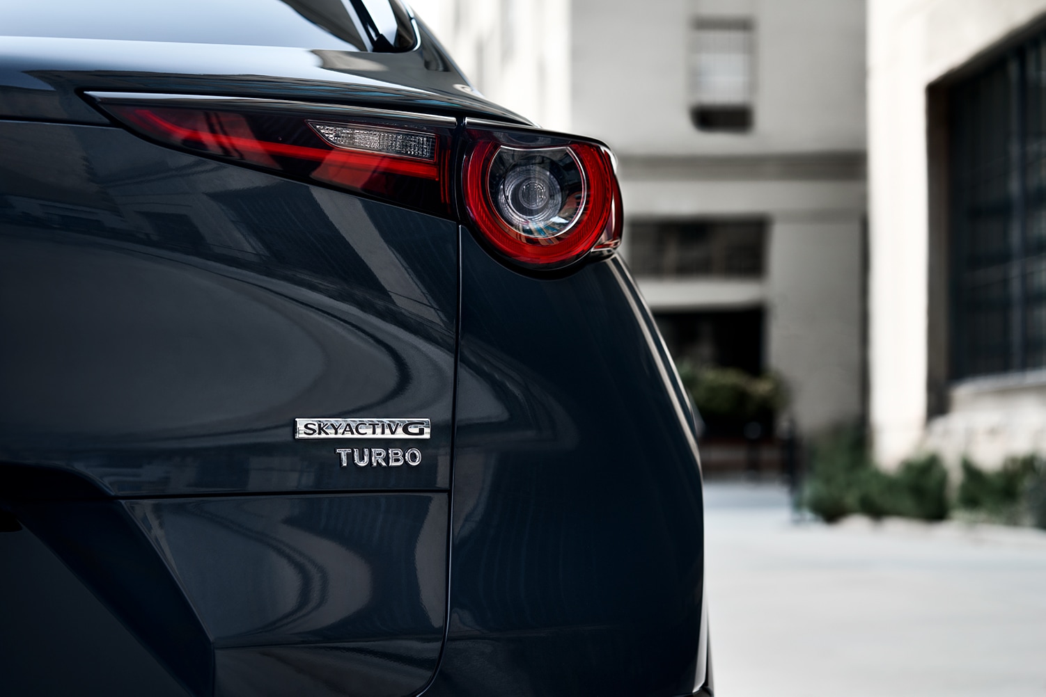 Compare the 2021 Mazda CX-30 vs. the 2022 Honda HR-V at Jack Giambalvo Mazda | 2021 Mazda CX-30 rear taillight and badges
