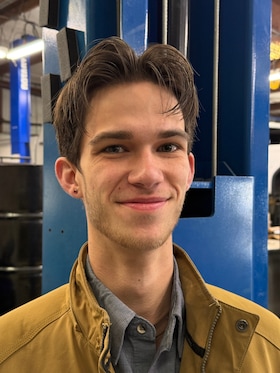Staff member Jordan Bellew from ID_483a25