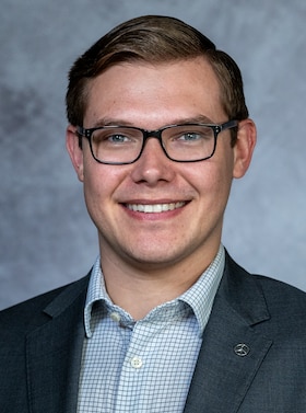 Staff member Dillon Cole from ID_39c74c52282f