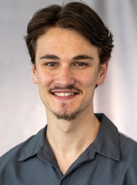 Staff member Alex Etchison from ID_49684c774993