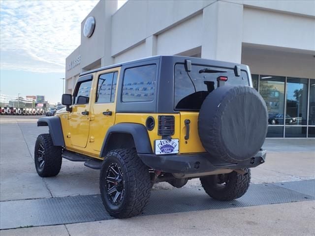 Used 2015 Jeep Wrangler Unlimited Sport with VIN 1C4BJWDG1FL698934 for sale in Claremore, OK