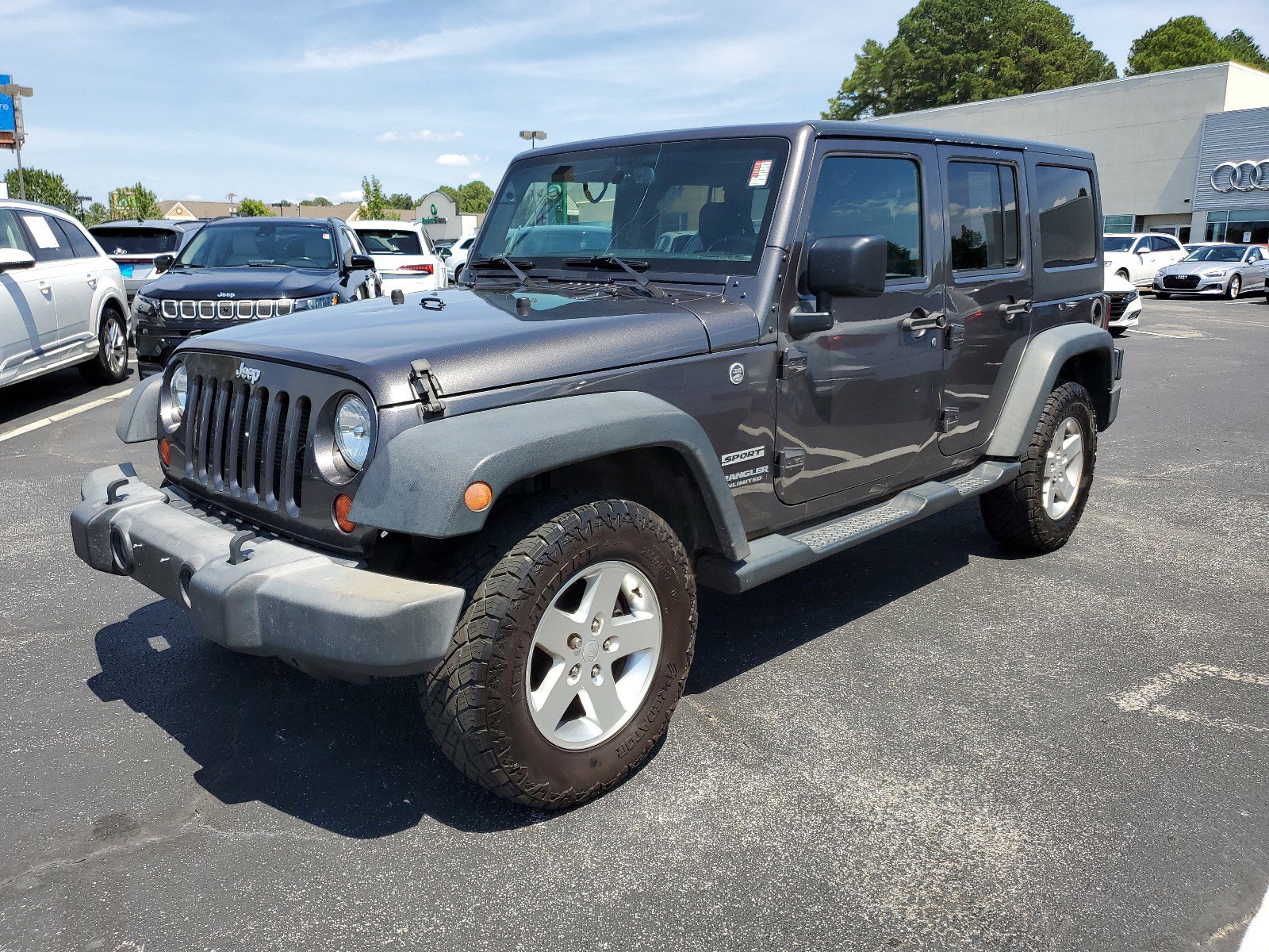 Used 2016 Jeep Wrangler Unlimited Sport S with VIN 1C4BJWDG5GL216273 for sale in Jackson, MS