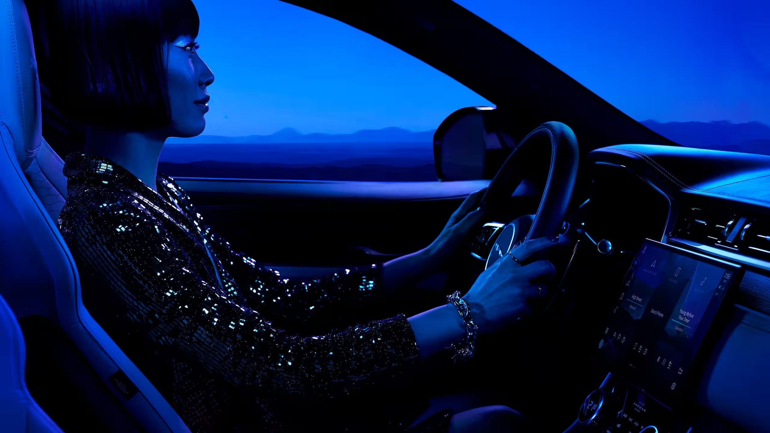 2024-jaguar-fpace-driver-woman.png