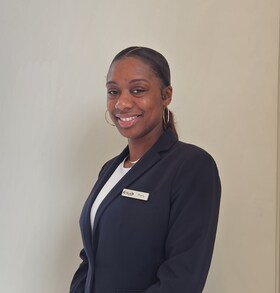 Staff member Mary Osei from ID_4cfc8ab5c091