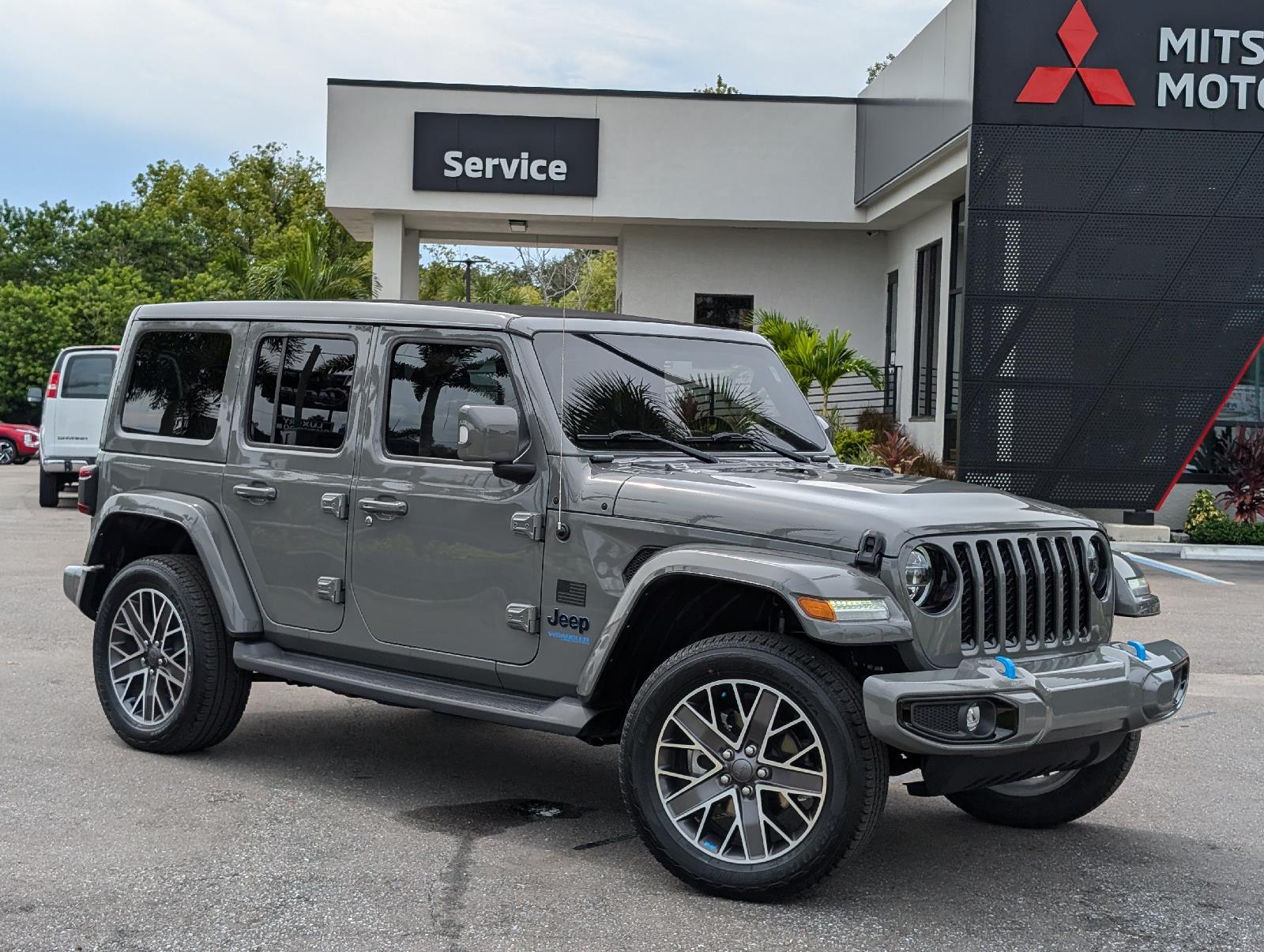 Used 2022 Jeep Wrangler Unlimited High Altitude 4XE with VIN 1C4JJXP66NW122547 for sale in New Port Richey, FL