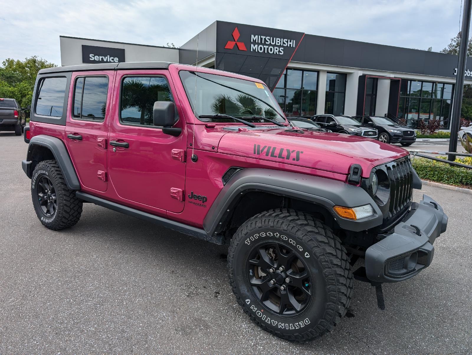 Used 2022 Jeep Wrangler Unlimited Willys with VIN 1C4HJXDMXNW157254 for sale in New Port Richey, FL