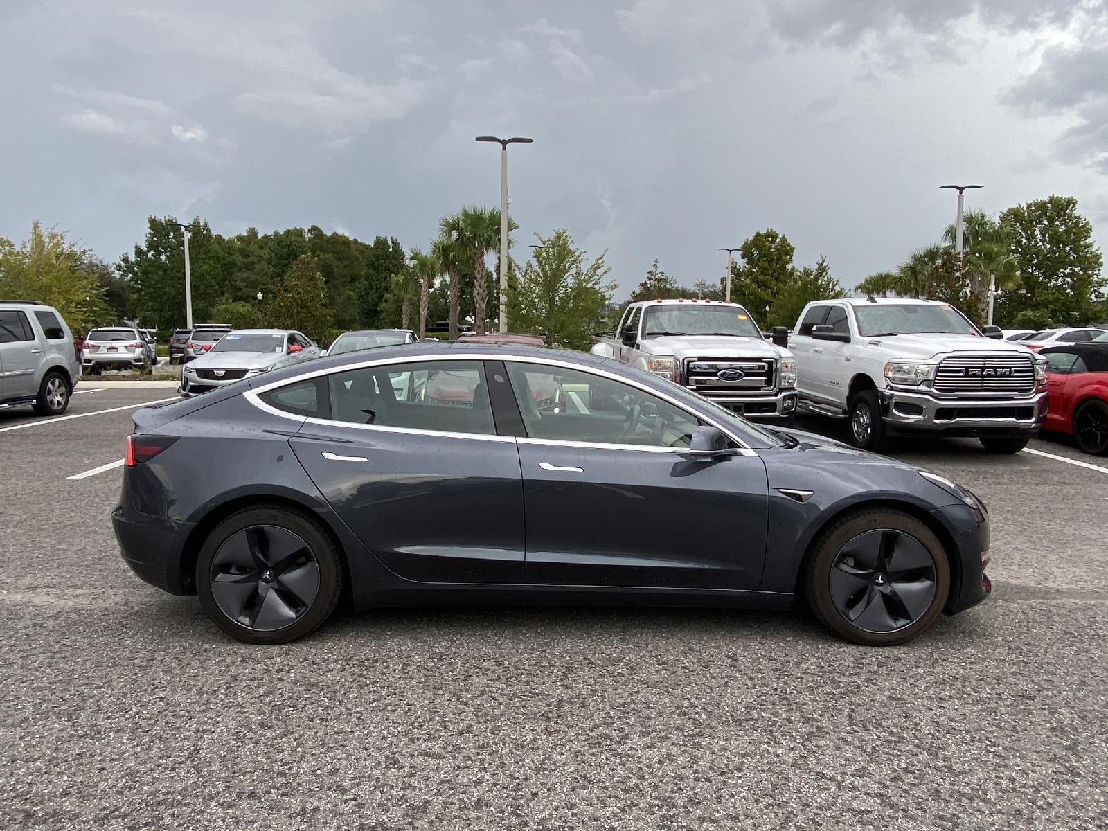 Used 2019 Tesla Model 3 Mid Range with VIN 5YJ3E1EAXKF313549 for sale in Wesley Chapel, FL