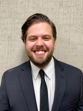 Staff member Joshua Adams from 7e0e9959e5c2