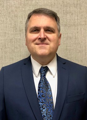 Staff member Dennis Fry from 7e0e9959e5c2