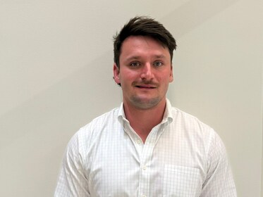 Staff member JJ Widel from 6473520c116b