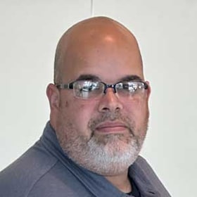 Staff member Eliezer Rivera from ID_2c9587f7d6e8