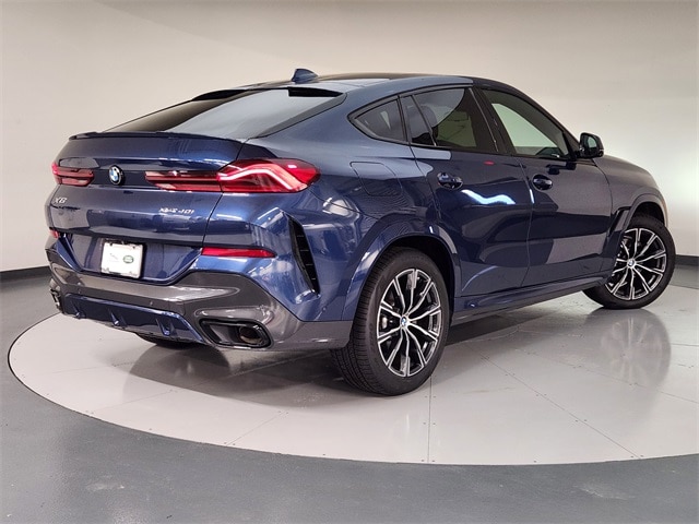 Used 2022 BMW X6 40i with VIN 5UXCY6C03N9K80566 for sale in Friendswood, TX