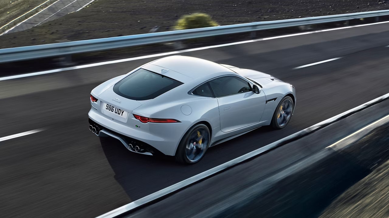 Overhead view behind a Jaguar vehicle on the road