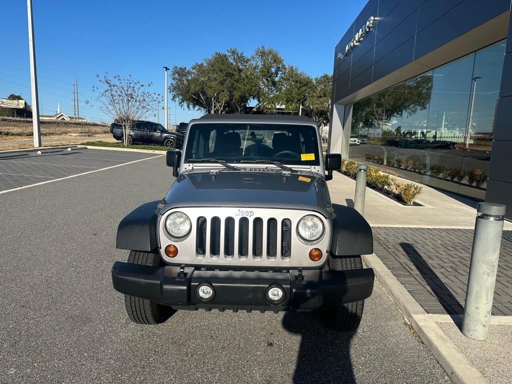 Used 2013 Jeep Wrangler Unlimited Sport with VIN 1C4BJWDG4DL632780 for sale in Lakeland, FL