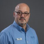 Staff member Constantine Panayotidis from ID_f7797ac86d19