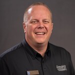 Staff member Jason Almond from ID_0dba2e36db41