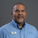 Staff member Neil Persad from ID_ac692cde086d