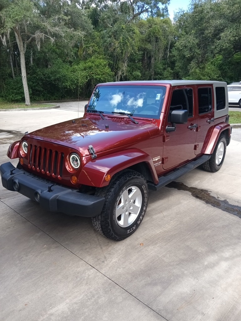 Used 2007 Jeep Wrangler Unlimited Sahara with VIN 1J4GB59187L142942 for sale in Tampa, FL