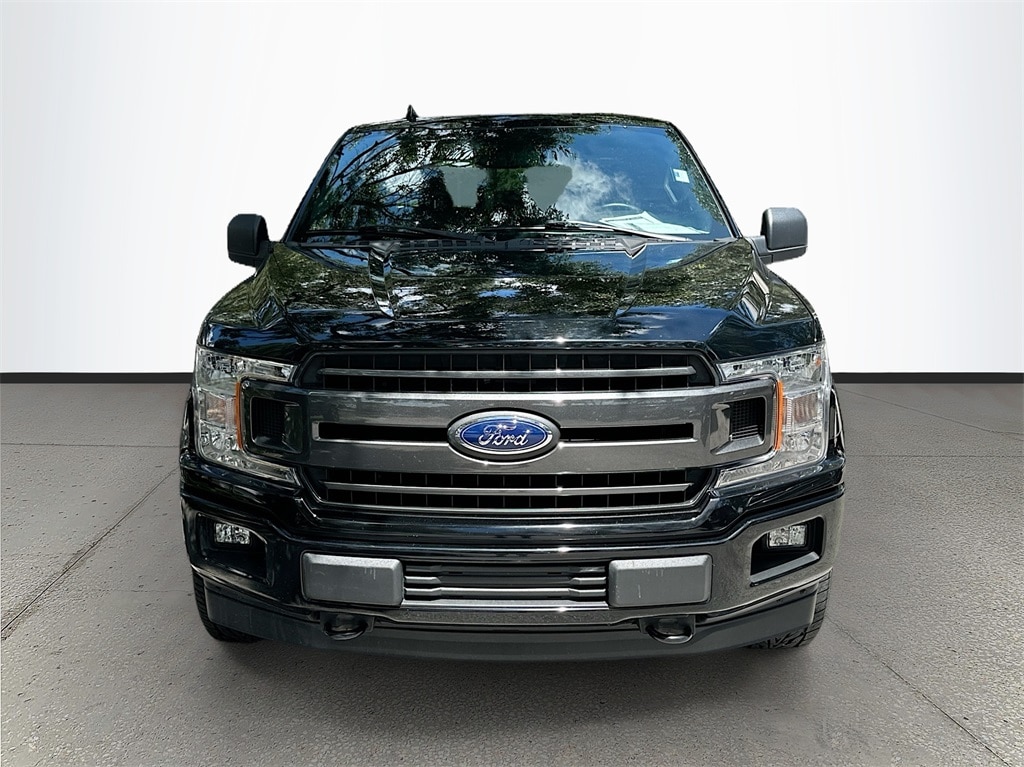 Used 2018 Ford F-150 XLT with VIN 1FTEW1E50JFE59171 for sale in Tampa, FL