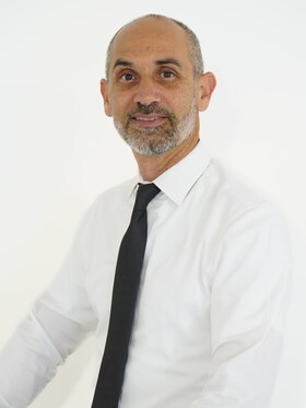 Staff member Abner Marrero from ID_bed14351ddc9