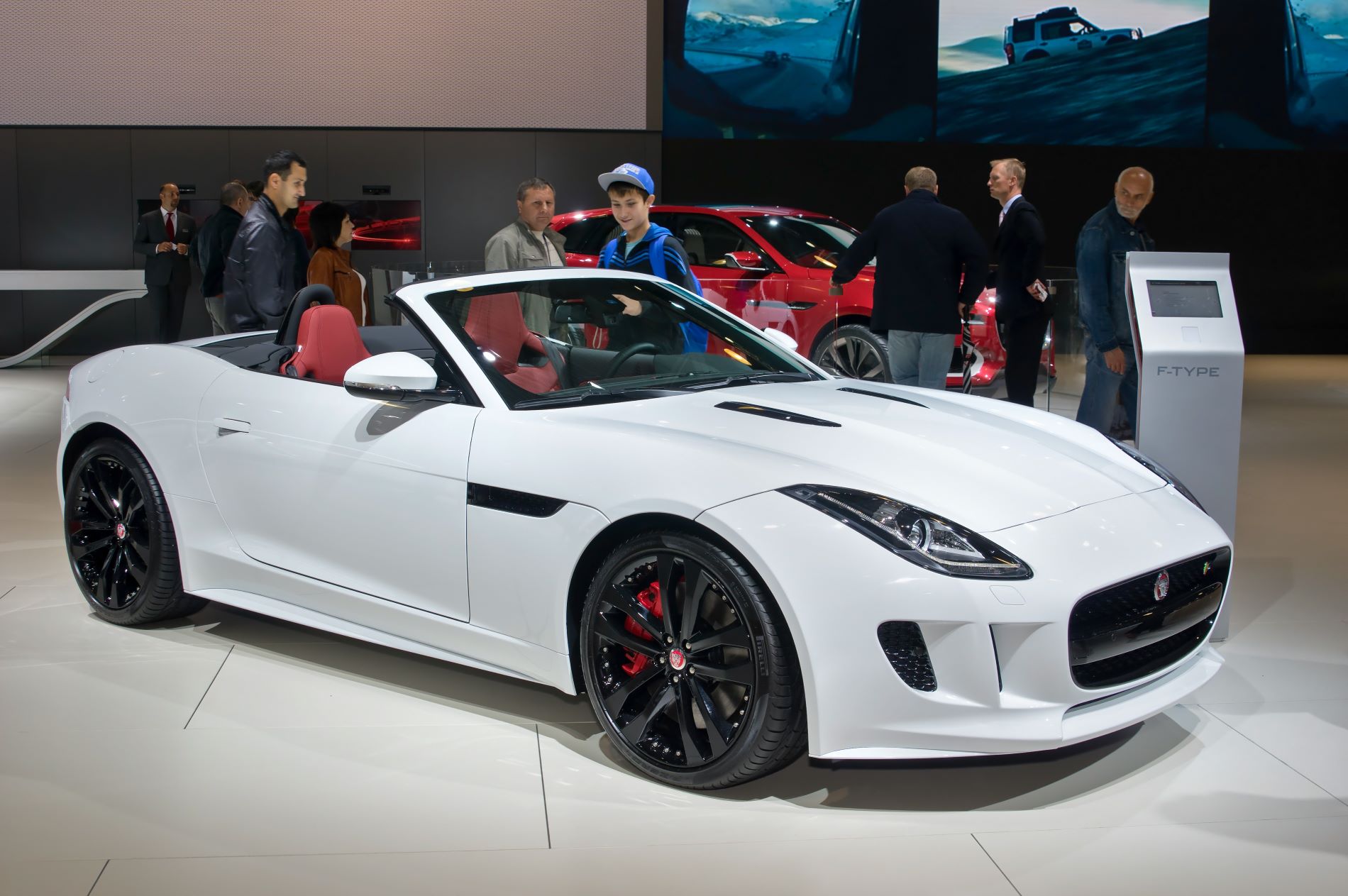 A picture of a Jaguar F-Type Coupe 2014 with its red brake calipers and external mapping providers