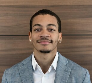 Staff member Caleb Granderson from f0c5319094e6