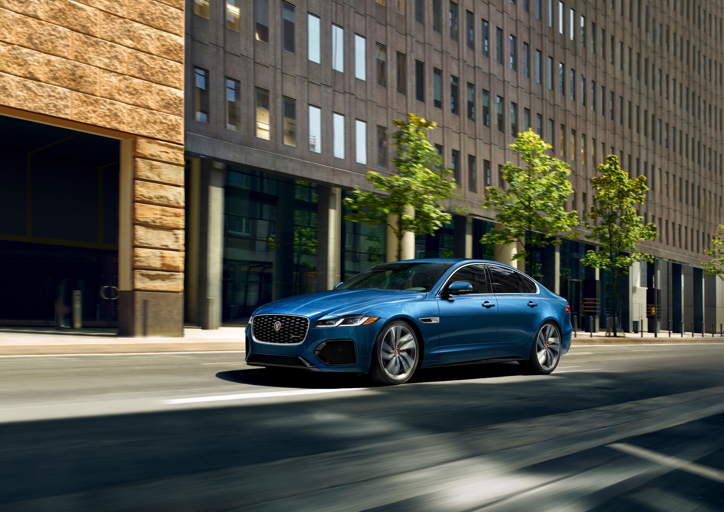 Jaguar XF driving through city