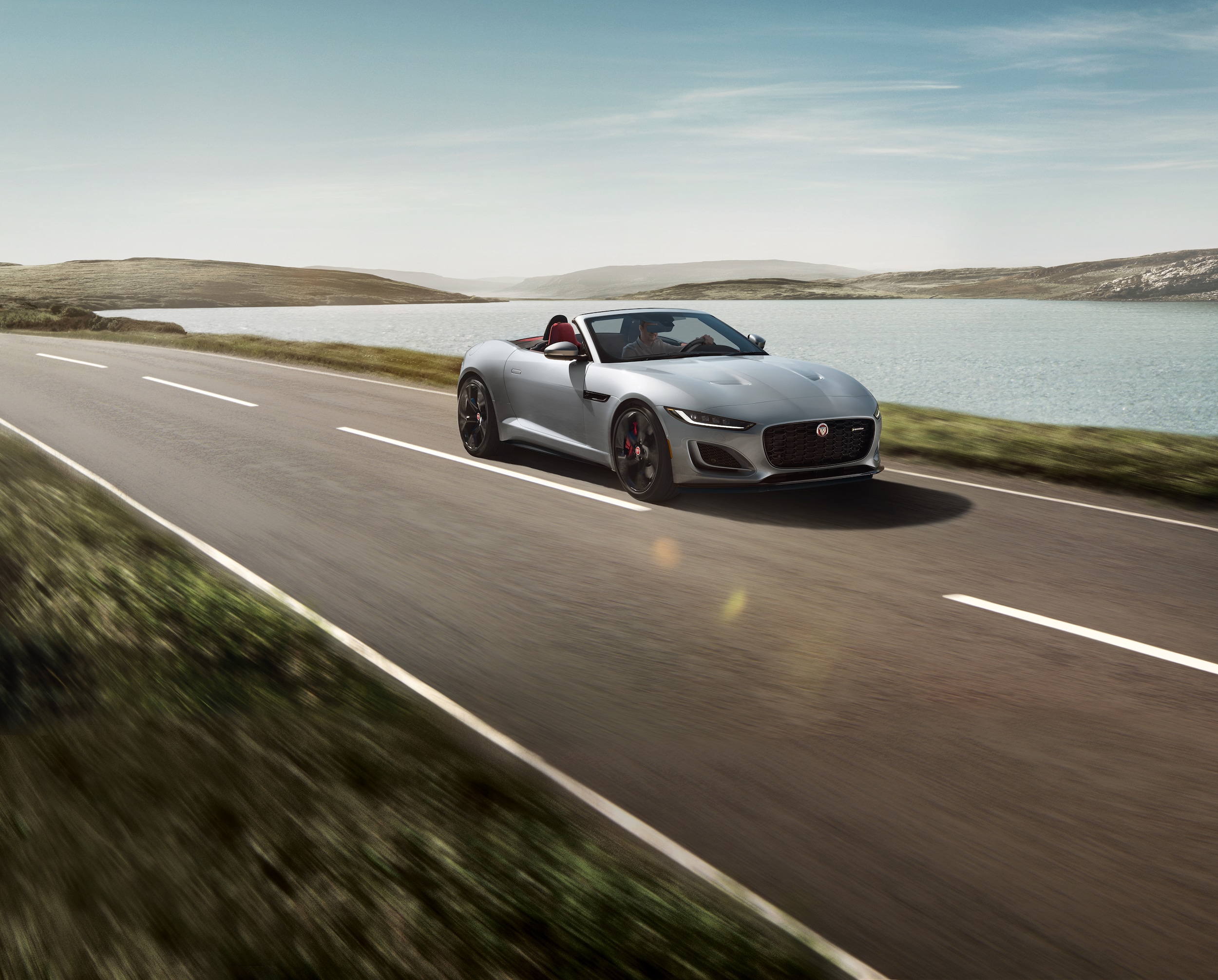 Jaguar F-TYPE driving with top down