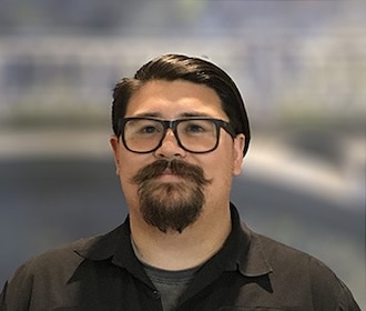 Staff member Tyler Le from 9ff10c3400fc