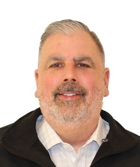 Staff member Stephen Miller from ID_0d39804a362c