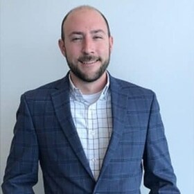 Staff member M.J. Diello from ID_7dc7d035cdbe
