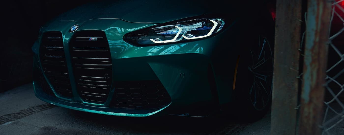 A close up shows the grille on a green 2022 BMW M3 after leaving a Mason BMW dealership.
