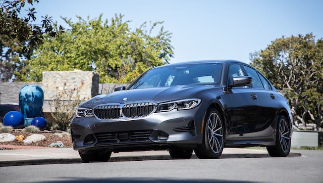 A gray 2020 BMW 3 Series is parked on a street in Cincinnati.
