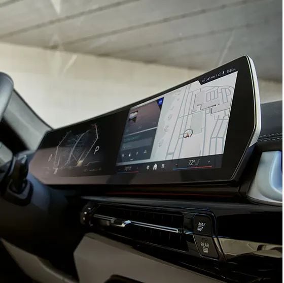 2025 BMW X1 interior showcasing its infotainment touchscreen.
