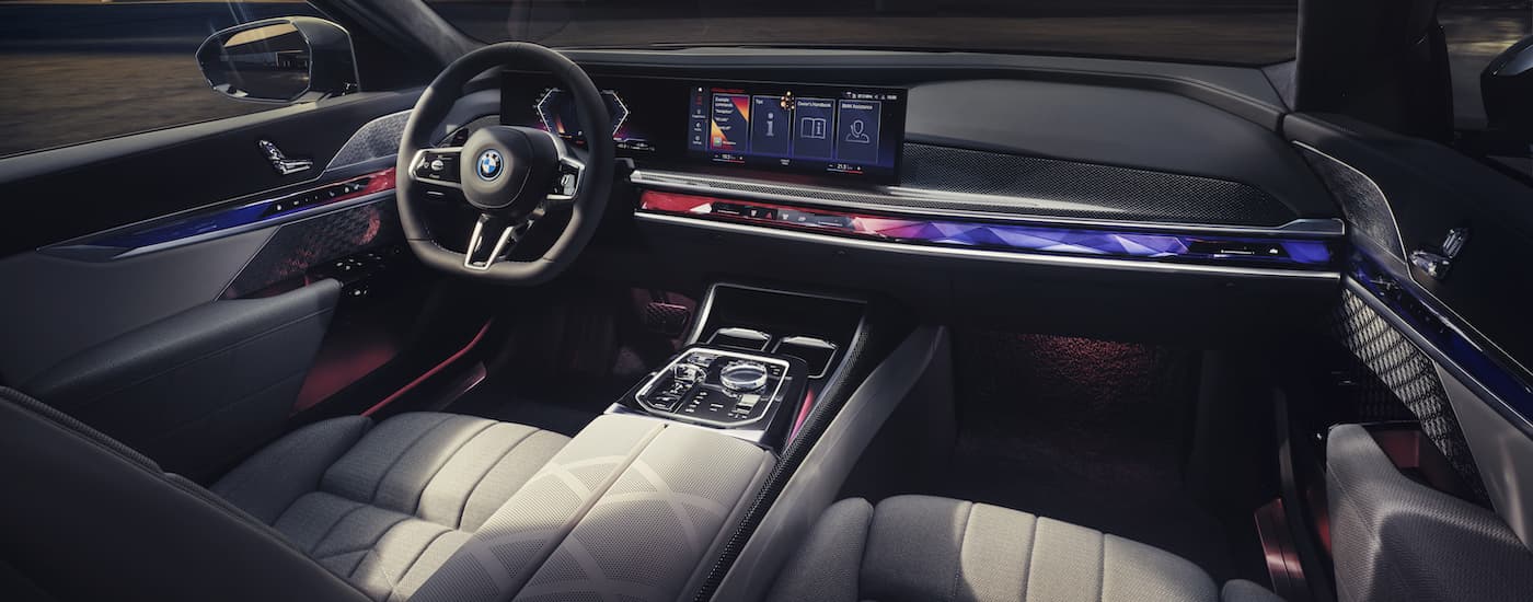 A close up shows the dash and accents in a 2022 BMW m760e.